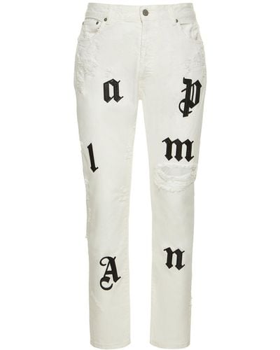 Palm Angels Jeans con patch logo - Bianco