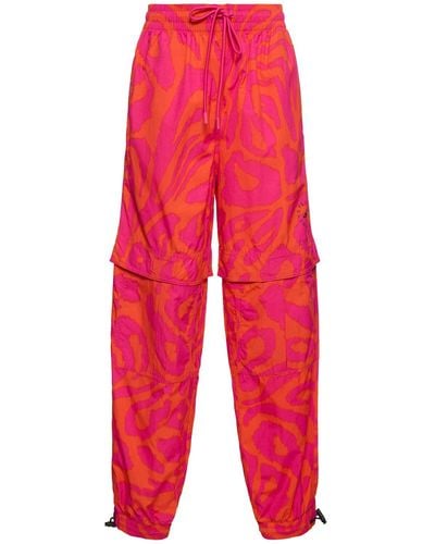 adidas By Stella McCartney Pantalones deportivos estampados - Rojo