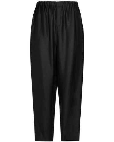 Saint Laurent Pantalones baggy con cintura alta - Negro