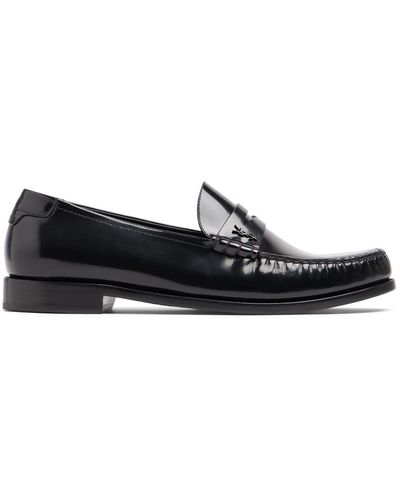 Saint Laurent Mocasines con logo en relieve - Negro