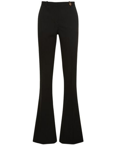 Versace Pantalones acampanados de gabardina de lana - Negro