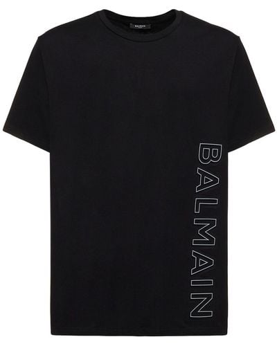 Balmain T-shirt en coton biologique à logo embossé - Noir