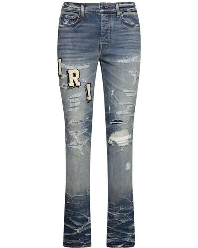 Amiri Skinny Jeans mit Logoapplikation in Distressed-Optik - Blau