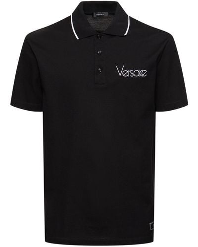 Versace Polo in cotone piqué con logo - Nero