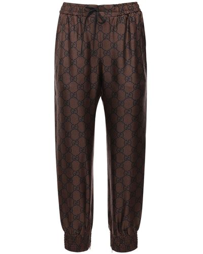 Gucci Gg Supreme Print Silk Twill Sweatpants - Brown