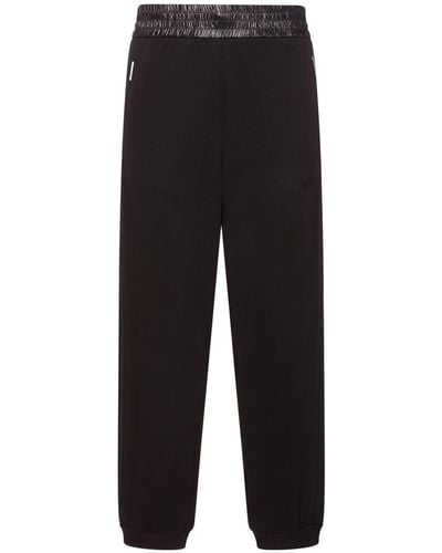 Moncler Genius Pantalones deportivos de jersey - Negro