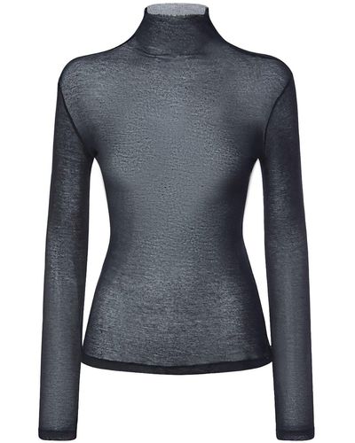 Ann Demeulemeester Chunky Knit Turtleneck Sweater, $726, farfetch.com