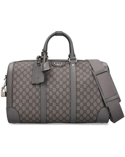 Gucci Bolso duffle con estampado gg - Gris