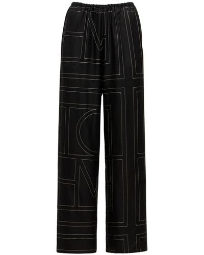 Totême Monogram Embroidered Silk Pants - Black