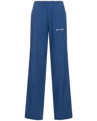 Palm Angels Pantaloni in cotone chambray - Blu