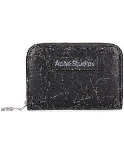 Acne Studios Portefeuille zippé en cuir acite - Noir