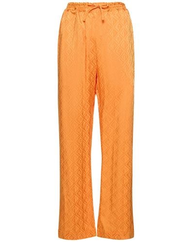 Marine Serre Pantalones anchos de satén con jacquard - Naranja