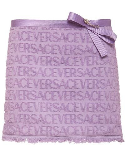 Versace Jupe courte en jacquard à logo dua lipa - Violet