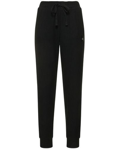 Alo Yoga Pantalones deportivos muse - Negro