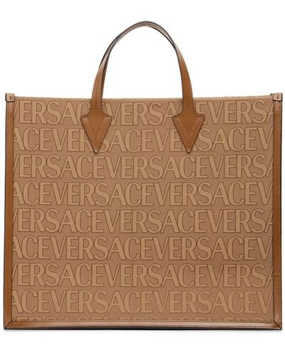 Versace Grand sac cabas en tissu et cuir - Marron