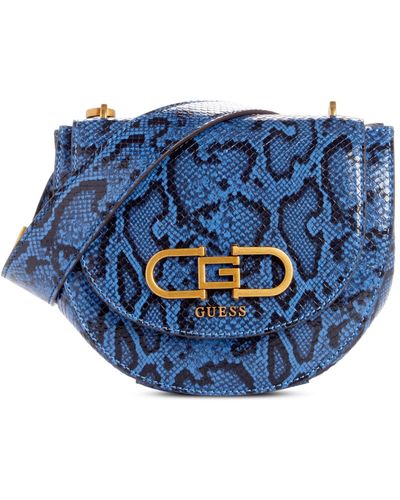 Guess Fleet Flap Small Saddle Crossbody Bag in Black | Lyst