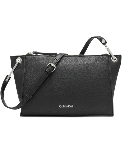 Calvin Klein Garnet Signature Top Zipper Adjustable Crossbody in Brown |  Lyst