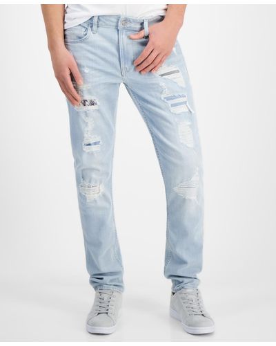 Guess Finnley Slim Tapered-fit Destroyed Jeans - Blue
