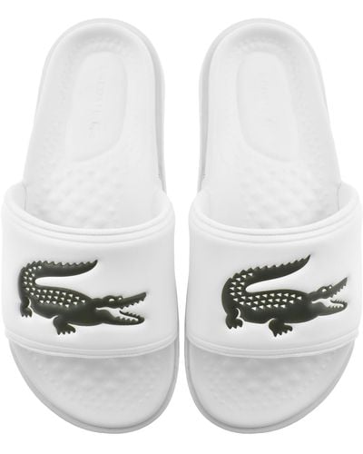 mens white lacoste sliders