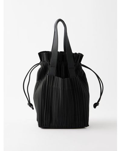 Pleats Please Issey Miyake Handbag With Front Zip (17,220 THB) ❤ liked on  Polyvore featuring bags, handbags, black, handbag purse,…