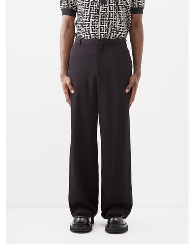 PUMA Mens Woven Trackpants X Balmain Pants DrawstringHalf ZipPockets   Black  Size M  Amazonin Clothing  Accessories