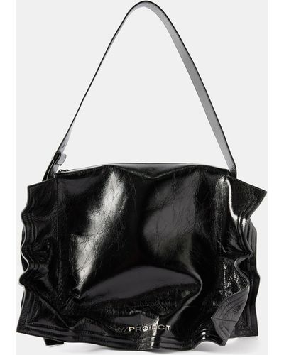 Y/Project Y Project Black Leather Accordion Tote Bag, $632, farfetch.com