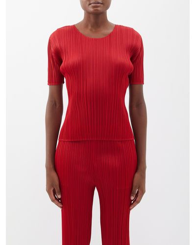 Haut à Manches Courtes ISSEY MIYAKE PLEATS PLEASE - Motif Pois Rouge Et Noir - Occasion Très Bon État