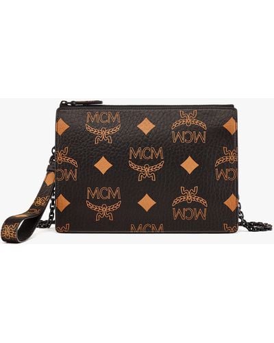MCM // Brown & Black Visetos Rombi Lion Pochette Bag – VSP Consignment
