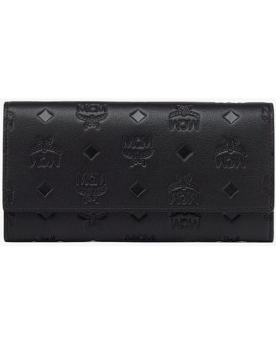 MCM Aren Continental Wallet In Embossed Monogram Leather - Black