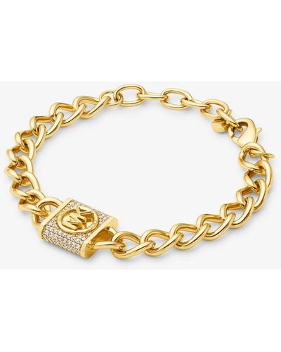 Michael Kors Bracciale a maglie curve in ottone placcato in metallo prezioso con lucchetto e pavé - Metallizzato