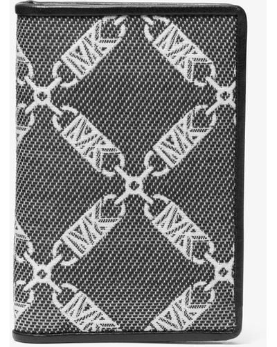 Michael Kors Tarjetero Hudson de dos pliegues de jacquard con logotipo imperio - Gris