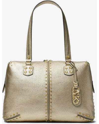 MICHAEL Michael Kors Bolso tote Astor grande de piel metalizada con tachuelas - Neutro