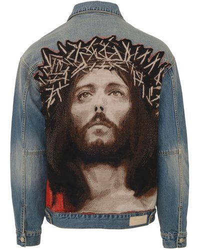ih nom uh nit Blue Denim Jacket With Used Effect And Patch Of Jesus' Image On The Back.