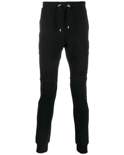 Balmain Pantaloni neri in cotone con logo stampato e tasche con zip - Nero