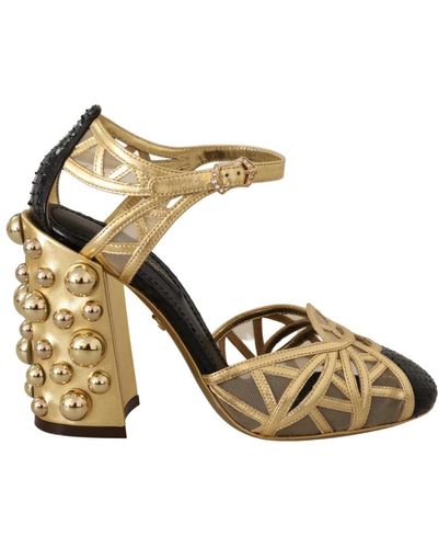 Dolce & Gabbana Zapatos de cuero negro y oro con correas de tobillo adornadas - Metálico