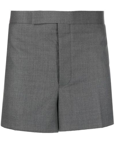 Thom Browne Low rise back strap mini shorts in super twill - Grau
