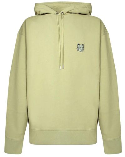 Maison Kitsuné Beiger baumwoll-hoodie besticktes patch - Grün
