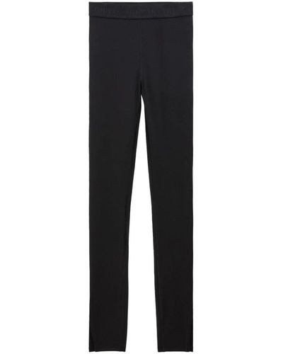 Filippa K Pantalones negros de tela elástica con cinturilla logo