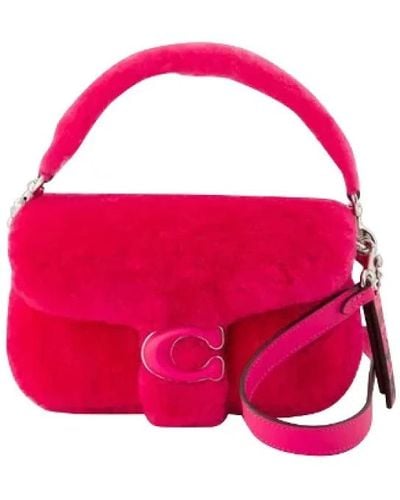 COACH Cross Body Bags - Pink