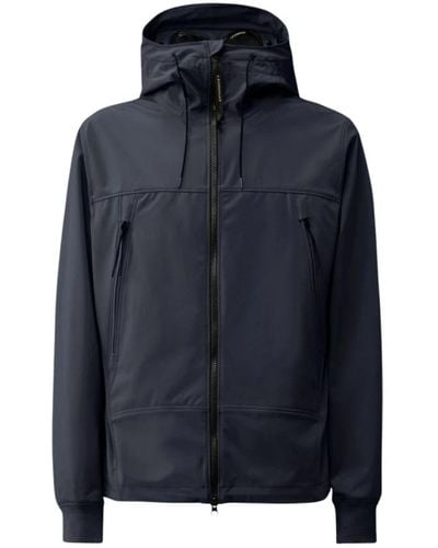 C.P. Company Softshell-jacke mit hohem kragen und goggle-kapuze - Blau