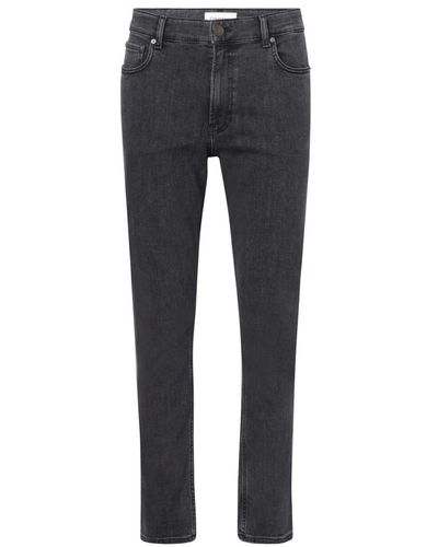 Calvin Klein Jeans tapered lavati nero denim - Grigio