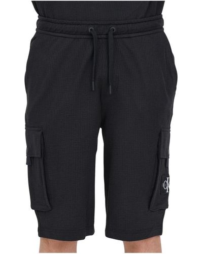 Calvin Klein Schwarze bermuda-shorts mit cargo-taschen