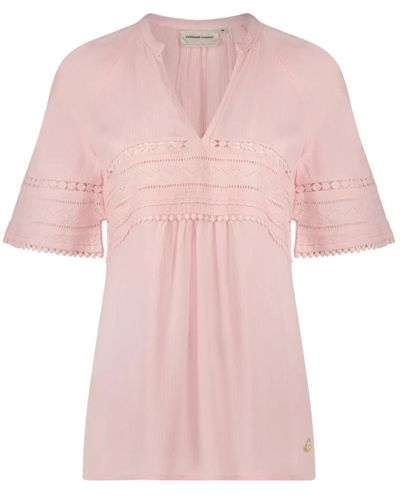 FABIENNE CHAPOT Top rosa con escote en v y detalles de pompones y calados