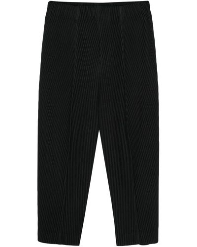 Issey Miyake Trousers > cropped trousers - Noir