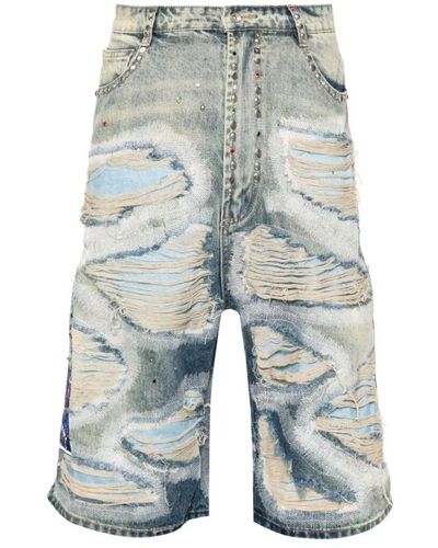 Who Decides War Blaue distressed denim jeans
