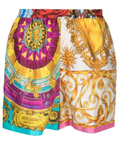 Moschino Shorts de seda estampados - Amarillo