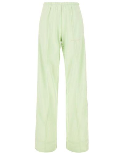 Palm Angels Pantalones de chándal verdes con detalles en contraste