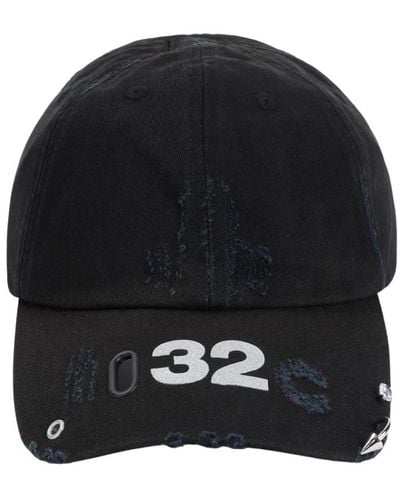 032c Cappello di cotone nero con dettagli metallici