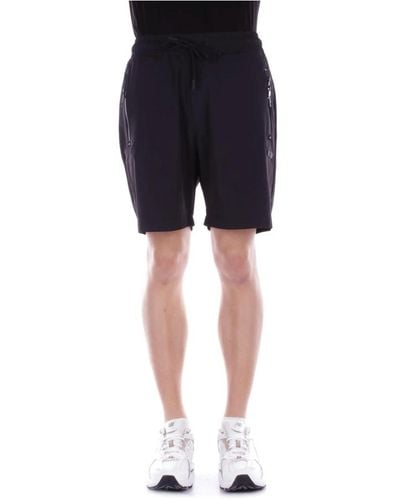 CoSTUME NATIONAL Schwarze cnc shorts mit reißverschlusstaschen - Blau