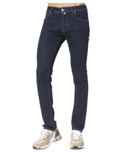 Jacob Cohen Jeans in denim grezzo blu navy con patch marrone